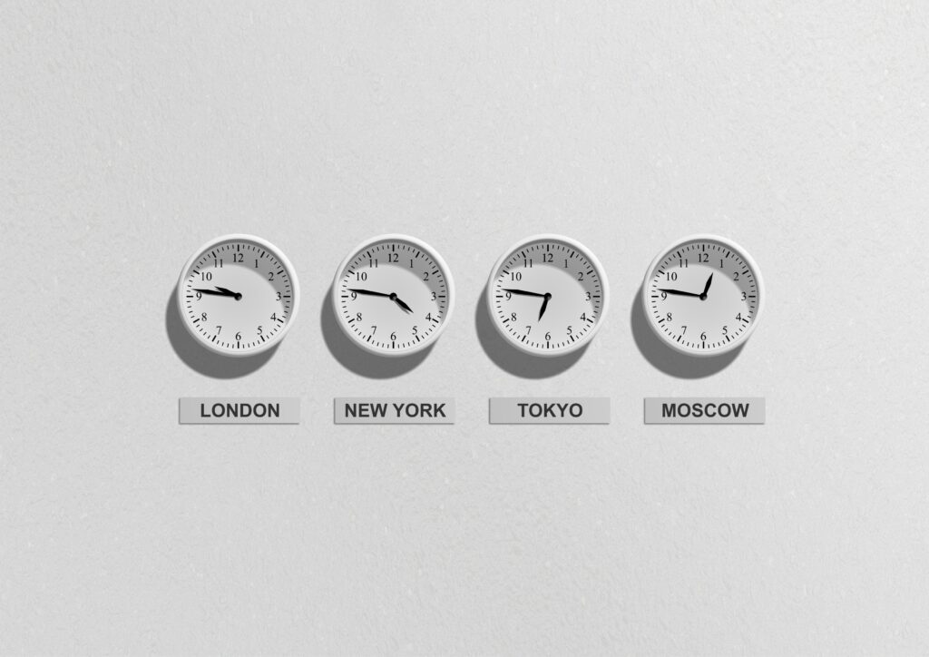 Picture of 4 watches with different time zones to illustrate the idea of intermittent fasting.
